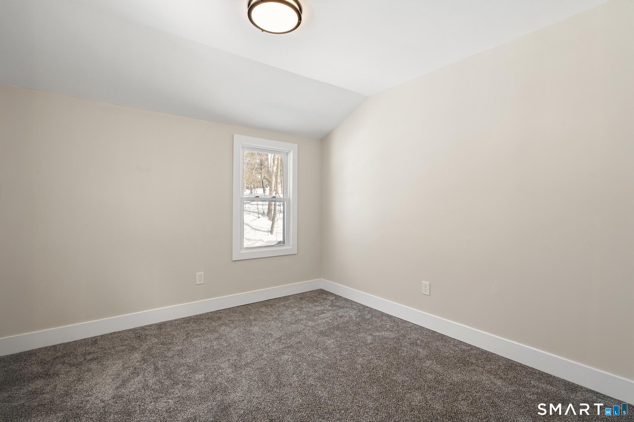 6 Juniper Ridge Drive Danbury, CT 06811 - Photo 28 of 36 an empty room with windows