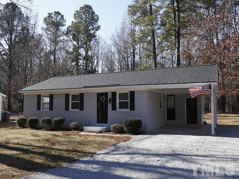 5912 Meadowbrook Road Raleigh, NC 27603 - Photo 1 of 12 a view of a house with a patio