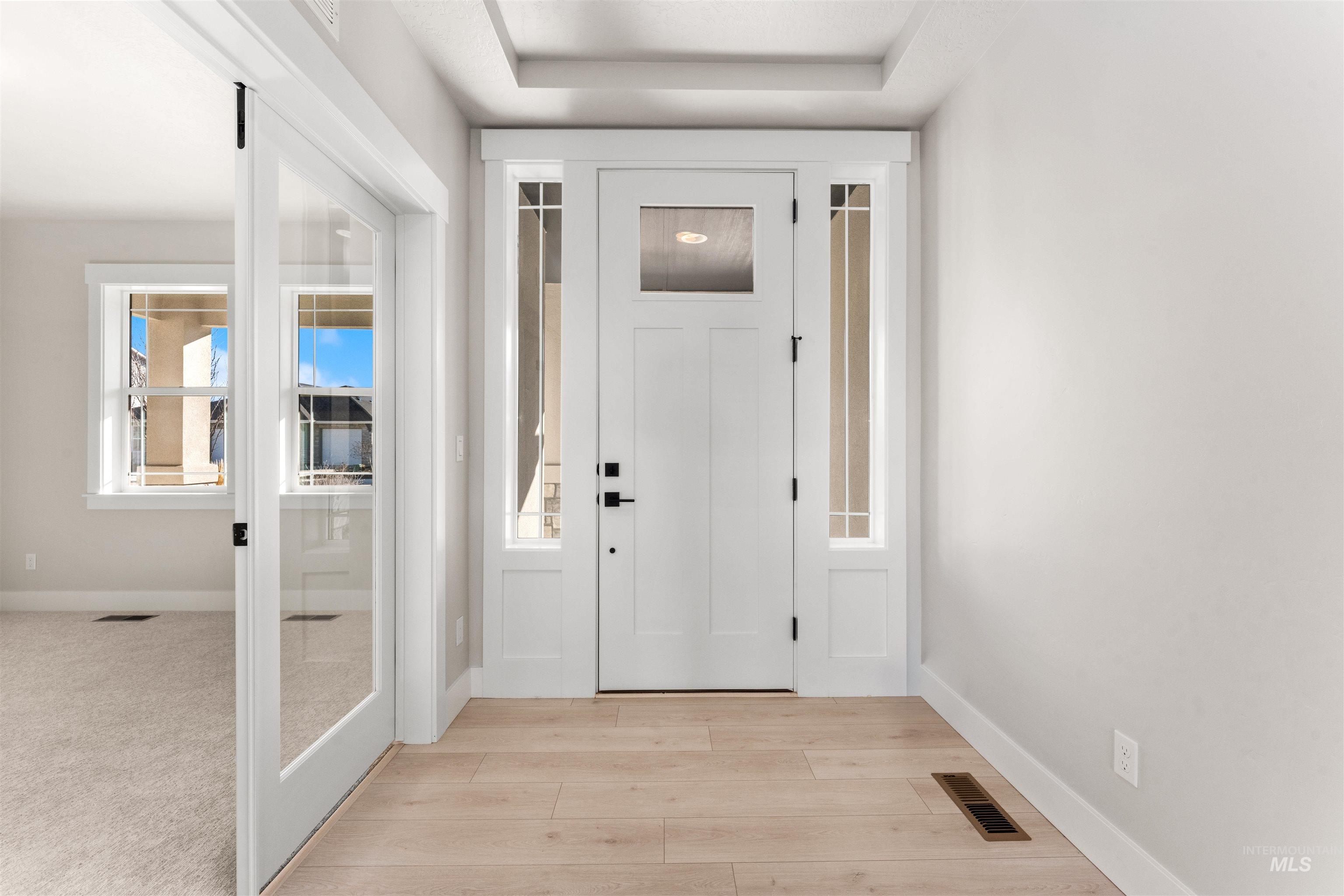 8084 Tandy Cv Street Middleton, ID 83644 - Photo 24 of 46 Entryway featuring baseboards and light wood-style flooring