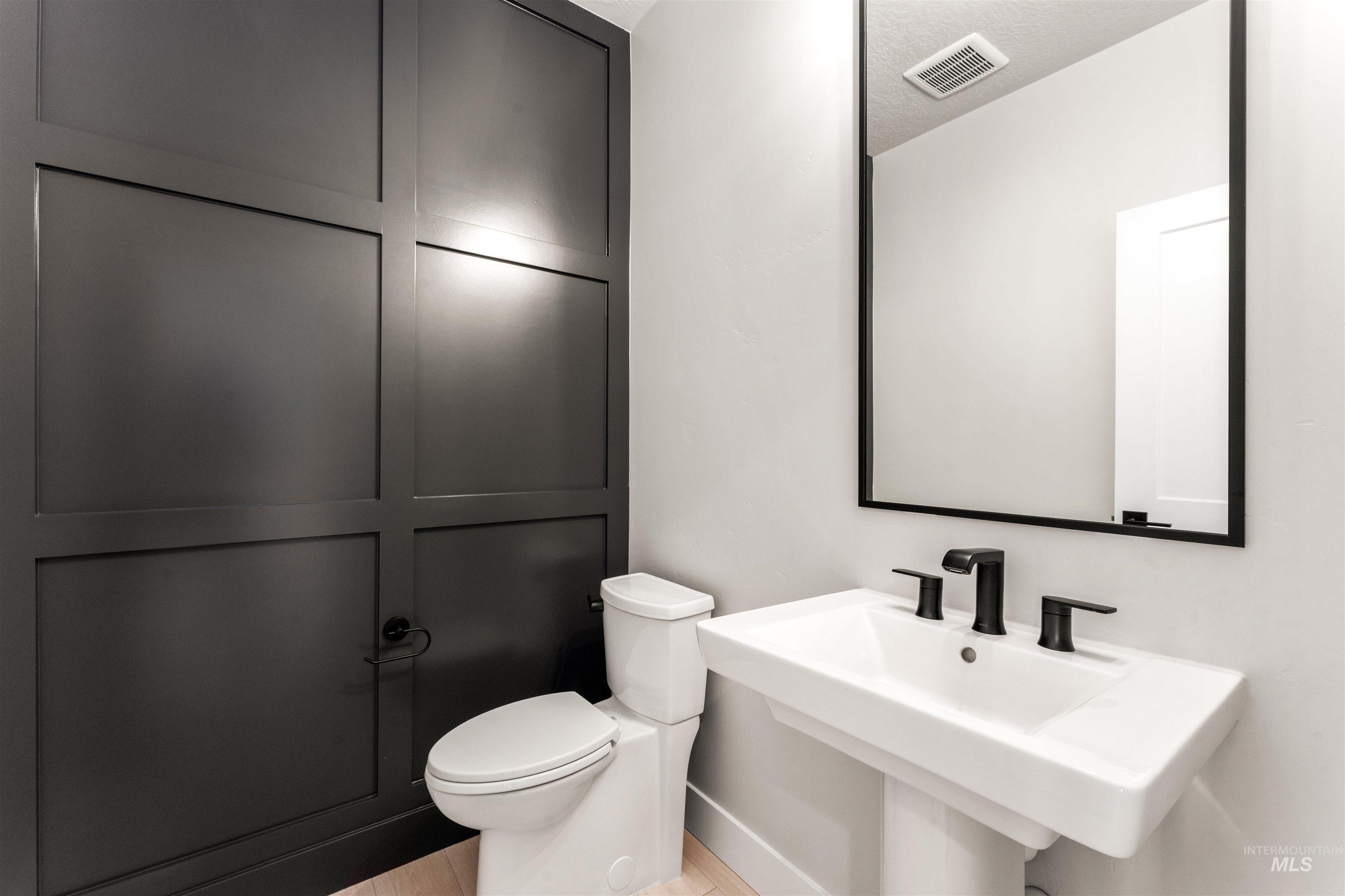 8084 Tandy Cv Street Middleton, ID 83644 - Photo 27 of 46 Bathroom with toilet and a textured ceiling