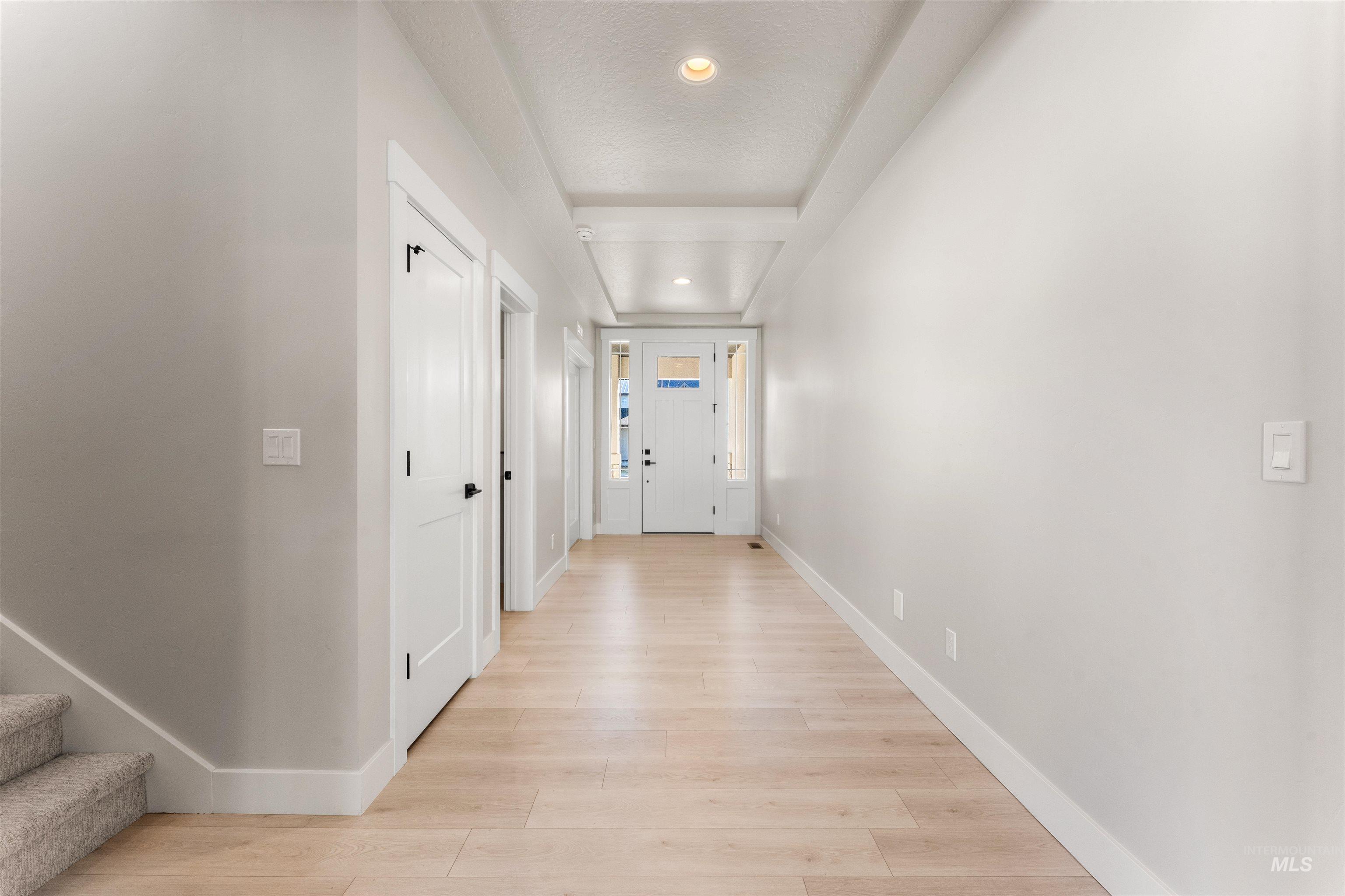 8084 Tandy Cv Street Middleton, ID 83644 - Photo 28 of 46 Corridor featuring light wood-type flooring and recessed lighting