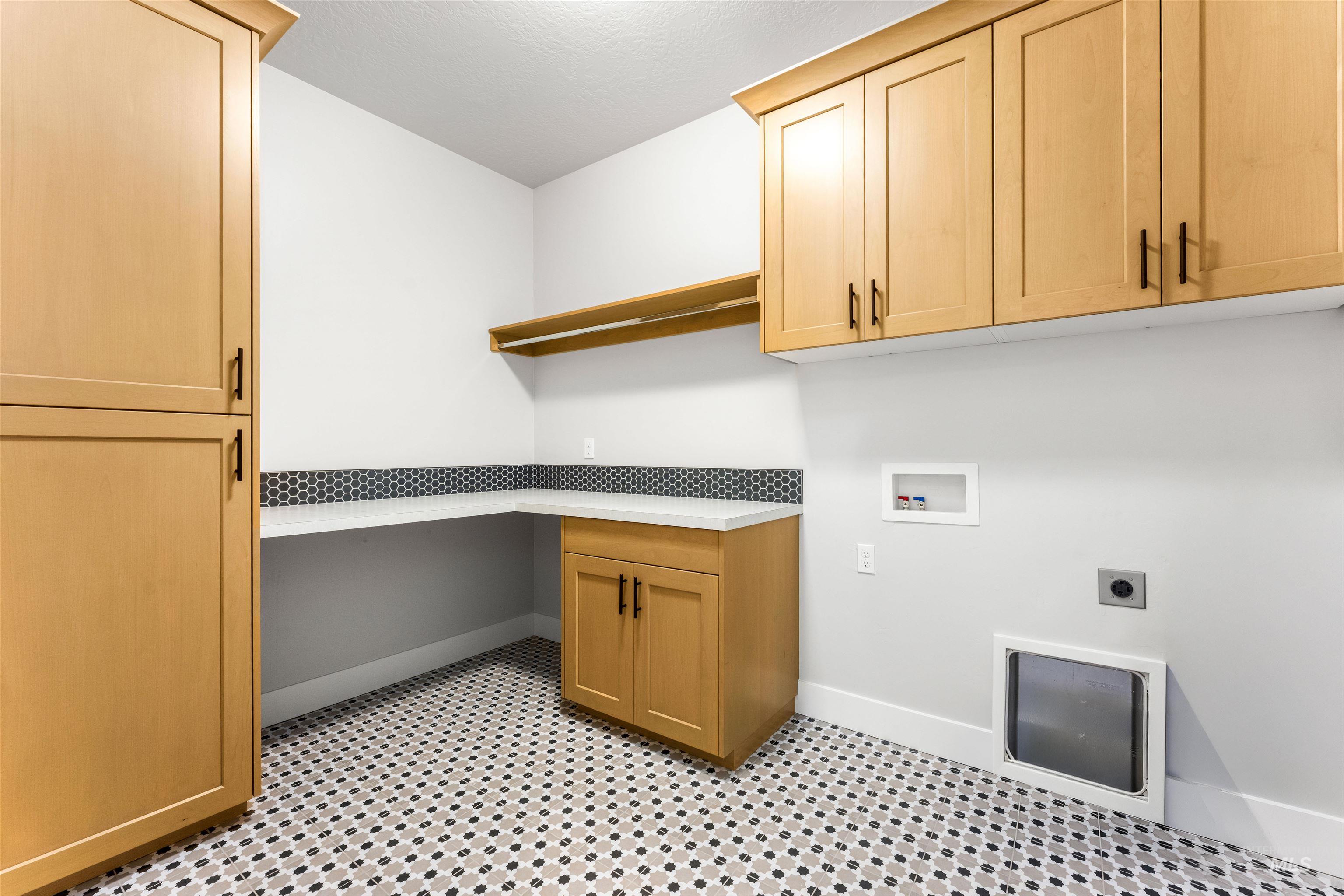 8084 Tandy Cv Street Middleton, ID 83644 - Photo 38 of 46 Laundry area with washer hookup, hookup for an electric dryer, and cabinet space