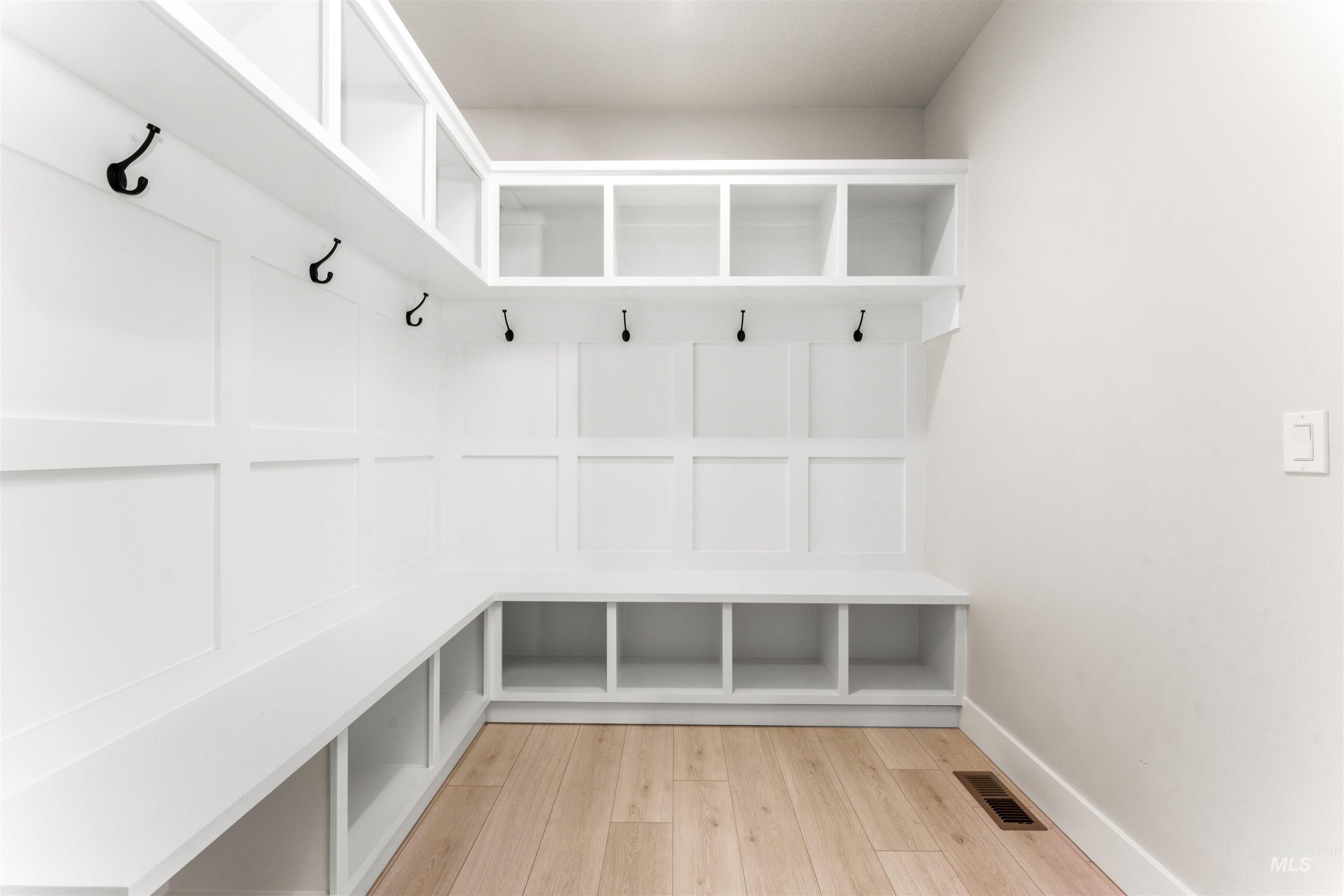 8084 Tandy Cv Street Middleton, ID 83644 - Photo 39 of 46 Mudroom with light wood-style flooring and baseboards