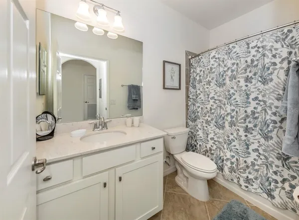 a view of a chairs and table in balcony