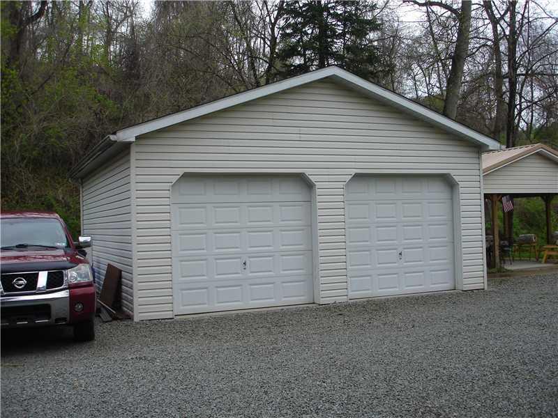 215 Jackson Road Plum, PA 15239 - Photo 3 of 20 Parking Lot/Garage. Oversized 2 Car Garage with Room for Storage, Work Bench Etc!
