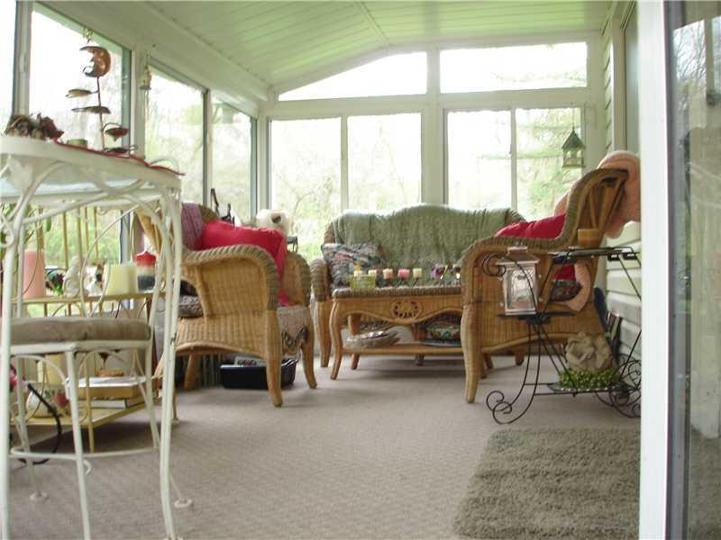 215 Jackson Road Plum, PA 15239 - Photo 4 of 20 Sunroom. Beautiful 3 Season Room Overlooking Back yard, and Woods Surrounding Rear & Side of Property!