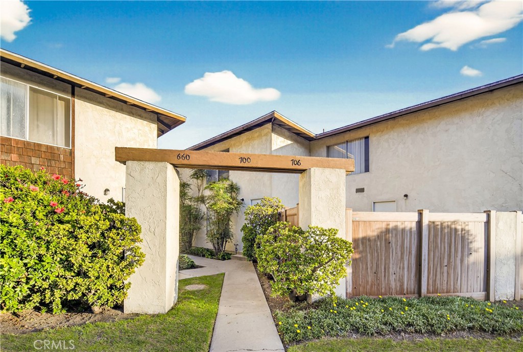 700 West Gonzales Road, Unit F Oxnard, CA 93036 - Photo 13 of 14 a front view of a house with garden