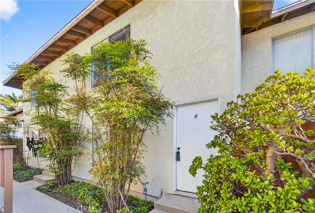 700 West Gonzales Road, Unit F Oxnard, CA 93036 - Photo 14 of 14 a plant that is in front of a house