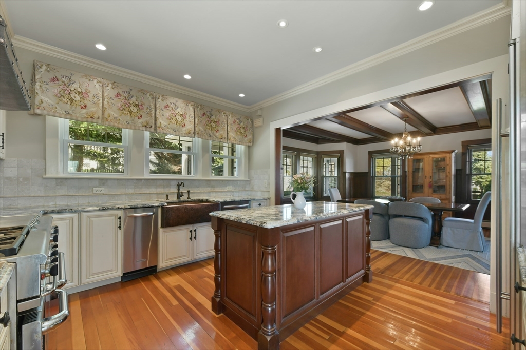 21 Beacon Road Hull, MA 02045 - Photo 14 of 40 a kitchen with a stove sink and cabinets