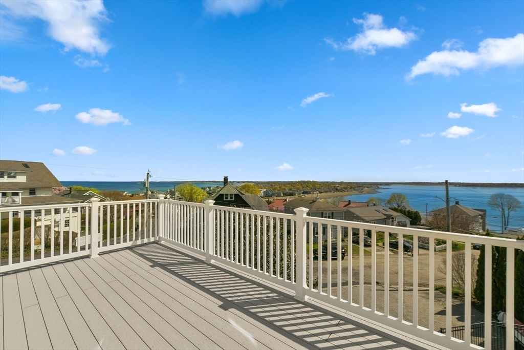 21 Beacon Road Hull, MA 02045 - Photo 22 of 40 a view of a balcony with wooden floor