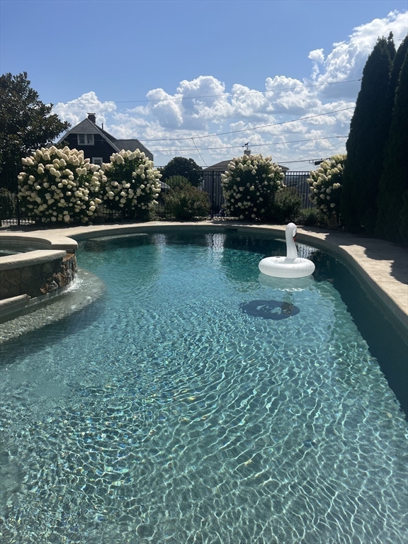 21 Beacon Road Hull, MA 02045 - Photo 28 of 40 a view of a lake with a yard