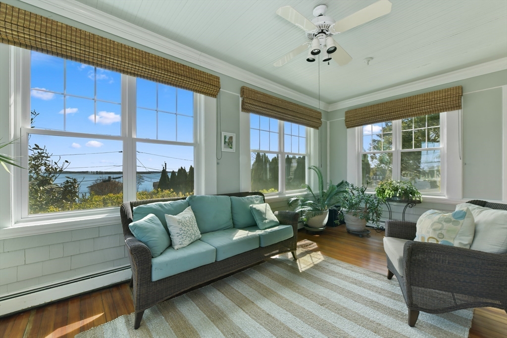 21 Beacon Road Hull, MA 02045 - Photo 9 of 40 a living room with furniture and a large window