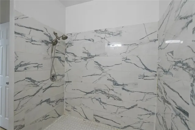 a bathroom with a sink toilet and a mirror