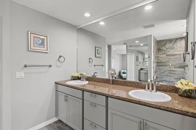 a view of a patio with couches and potted plants