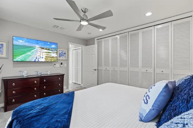 a view of a lake with a house in the background