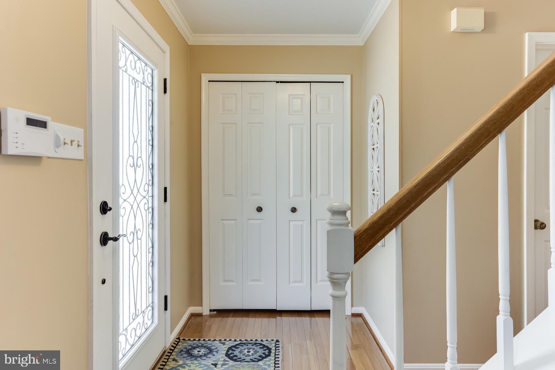 307 Riding Ridge Road Annapolis, MD 21403 - Photo 2 of 36 a view of entryway with wooden floor and stairs