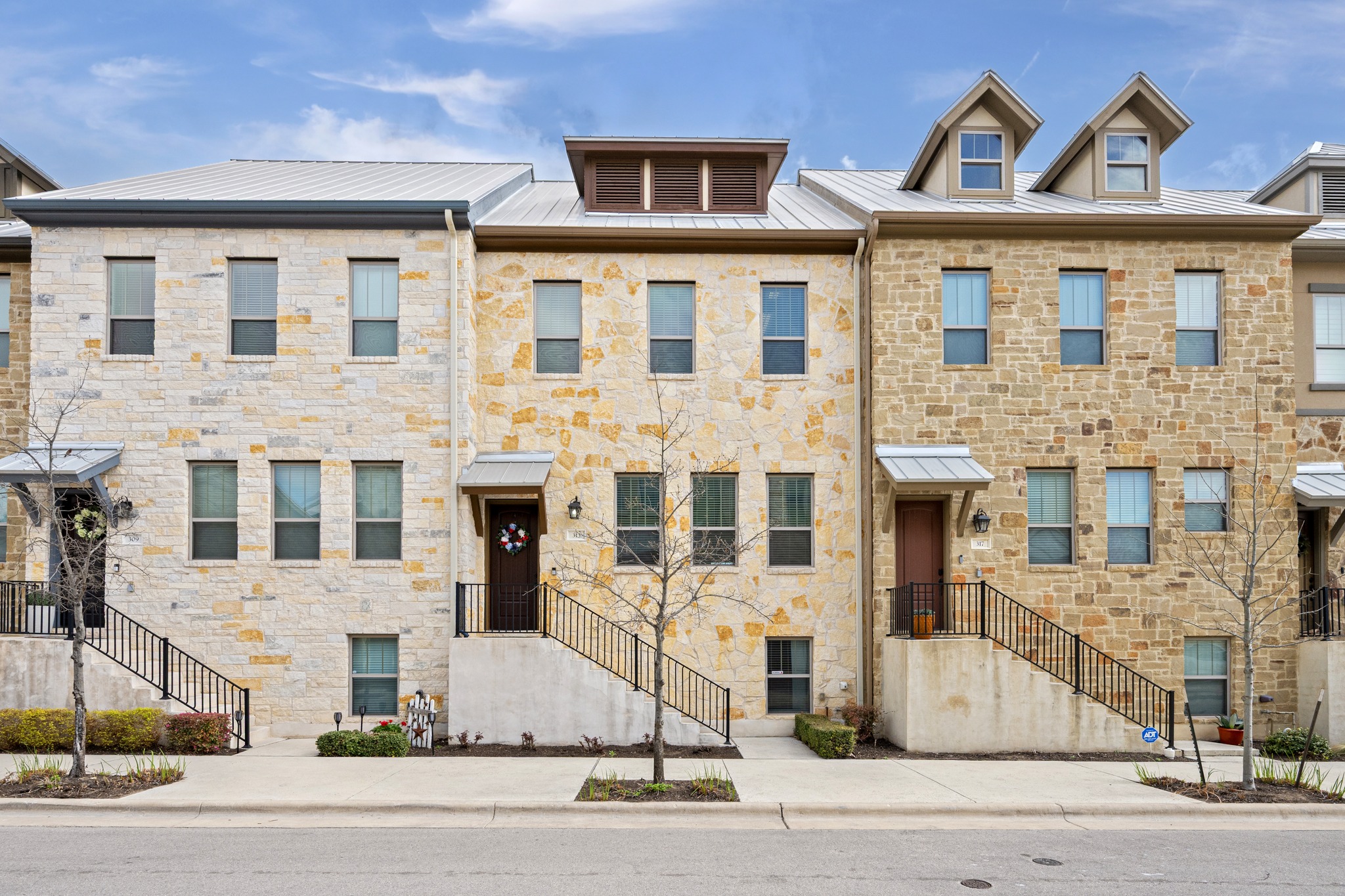 front view of a building with a street