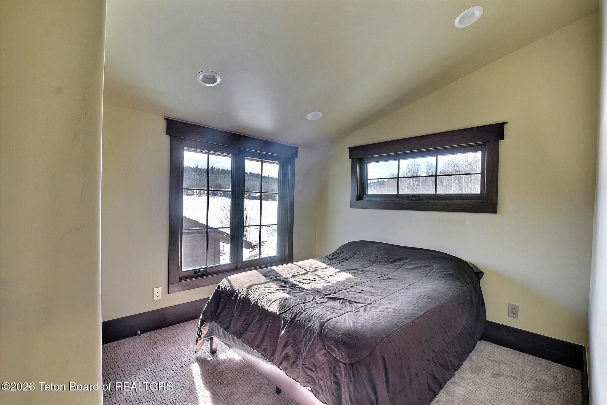 9802 Hiddenwaters Lane Victor, ID 83455 - Photo 25 of 52 Upper Level Bedroom 2
