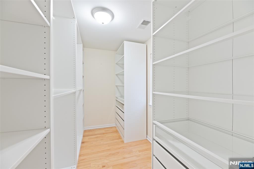 902 Spruce Street Roselle, NJ 07203 - Photo 20 of 32 a bathroom with a bathtub and a shower