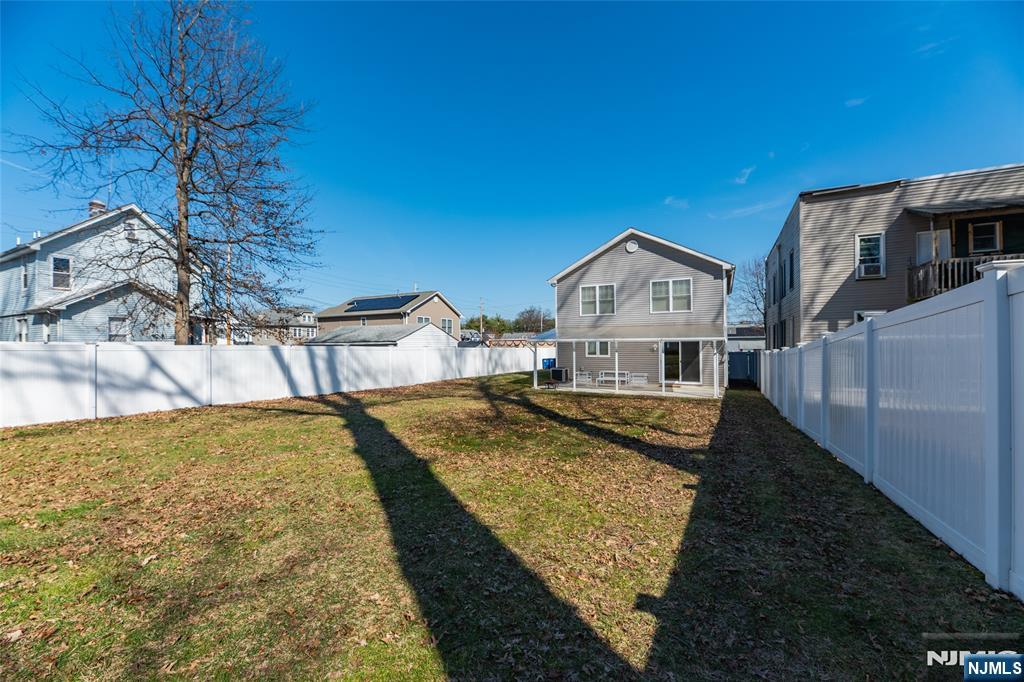 902 Spruce Street Roselle, NJ 07203 - Photo 28 of 32 a front view of a house with swimming pool