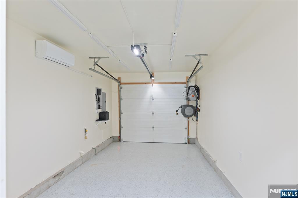 902 Spruce Street Roselle, NJ 07203 - Photo 32 of 32 a view of a room with rack on the wall