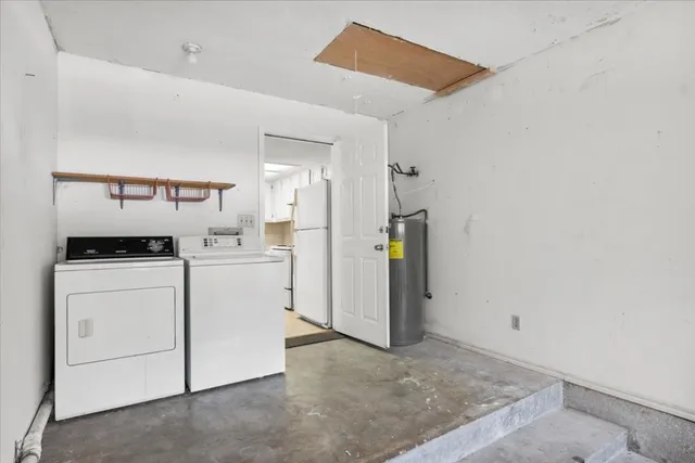 a utility room with dryer and washer