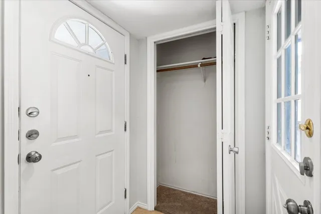 a bathroom with a glass shower door