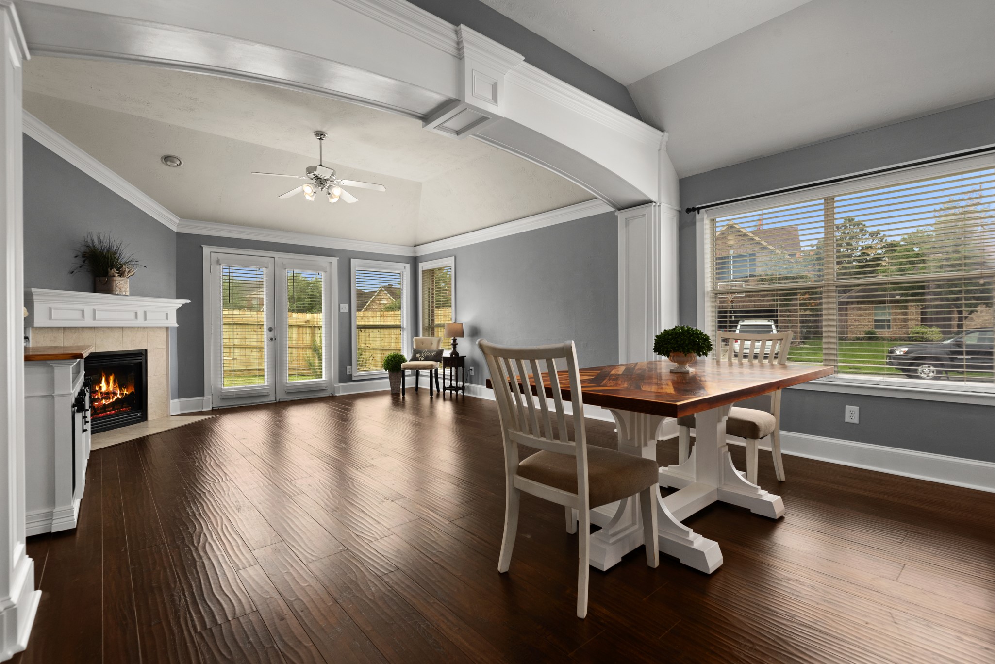 21710 Colter Stone Drive Spring, TX 77388 - Photo 12 of 35 Stunning custom wood arches adorn the home (Table/Chairs not included).