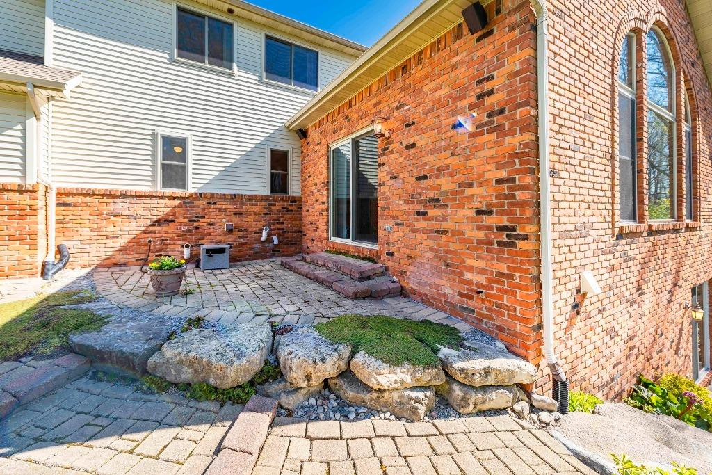 37211 Howard Road Farmington Hills, MI 48331 - Photo 19 of 83 Paver patio with natural stone edging