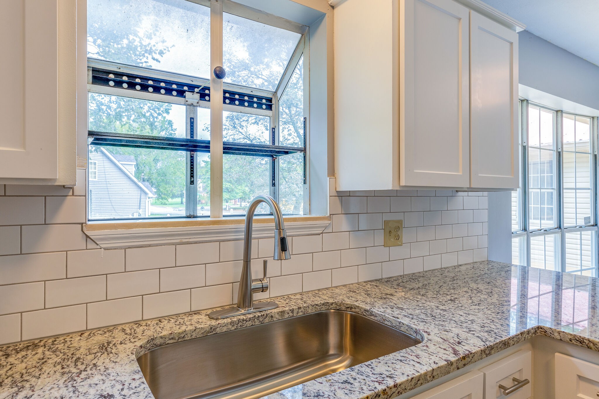3218 Country Hill Road Antioch, TN 37013 - Photo 9 of 22 a kitchen with a sink and large window