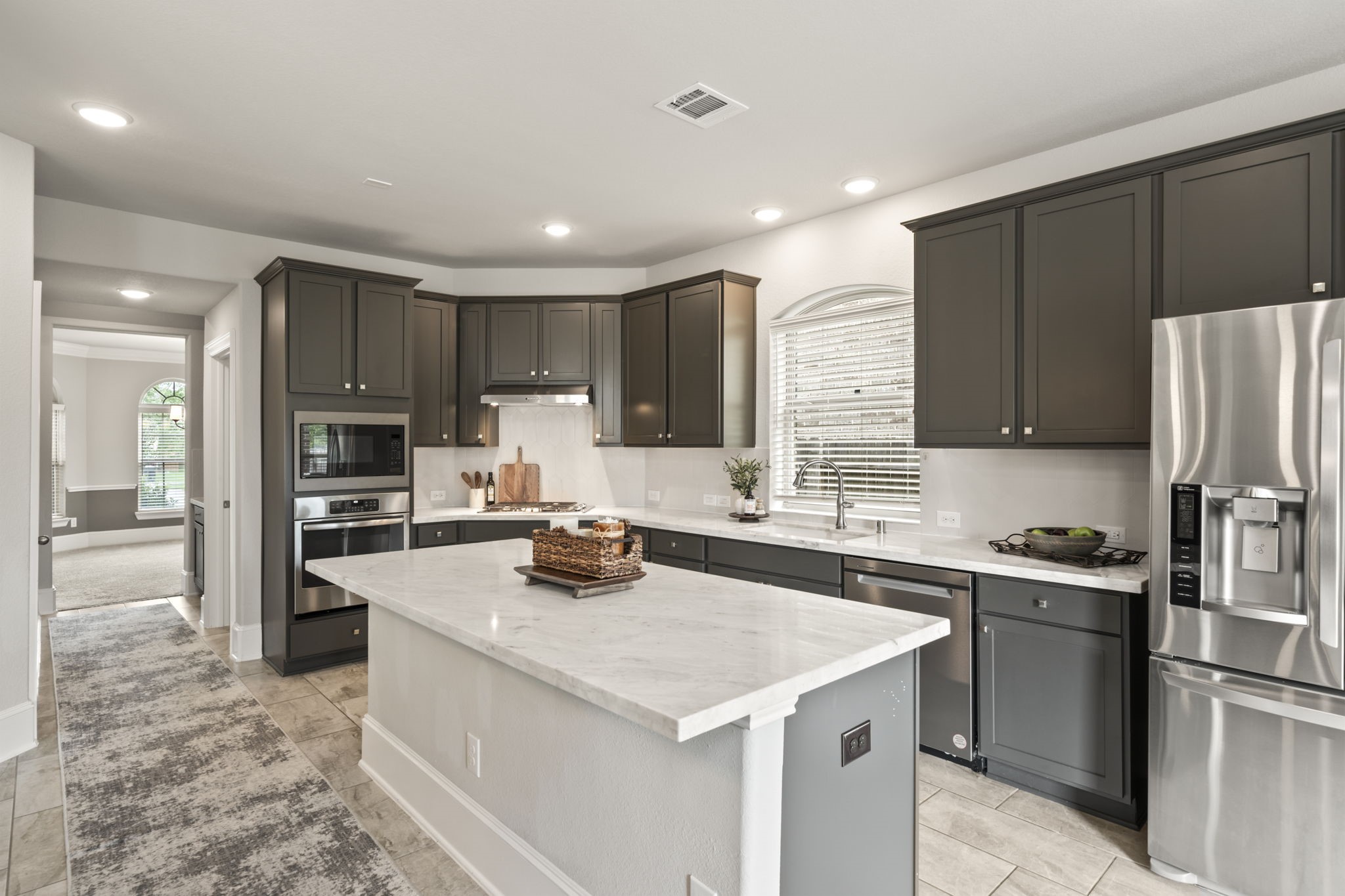 3938 Avalon Ridge Drive Spring, TX 77386 - Photo 9 of 49 This kitchen is attractive and functional with granite counters and stainless appliances