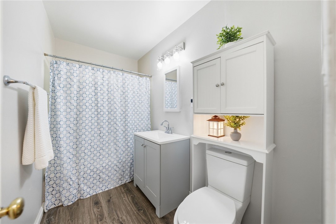 4869 Serrano Place Riverside, CA 92504 - Photo 26 of 40 Bright and refreshed bathroom featuring a clean design, updated vanity, and additional storage space.