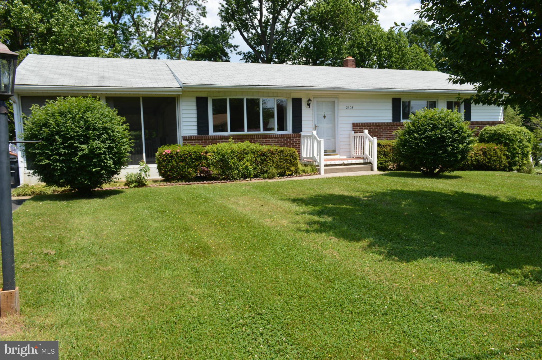 2308 Reckord Road Joppa, MD 21085 - Photo 1 of 17 a front view of a house with a yard