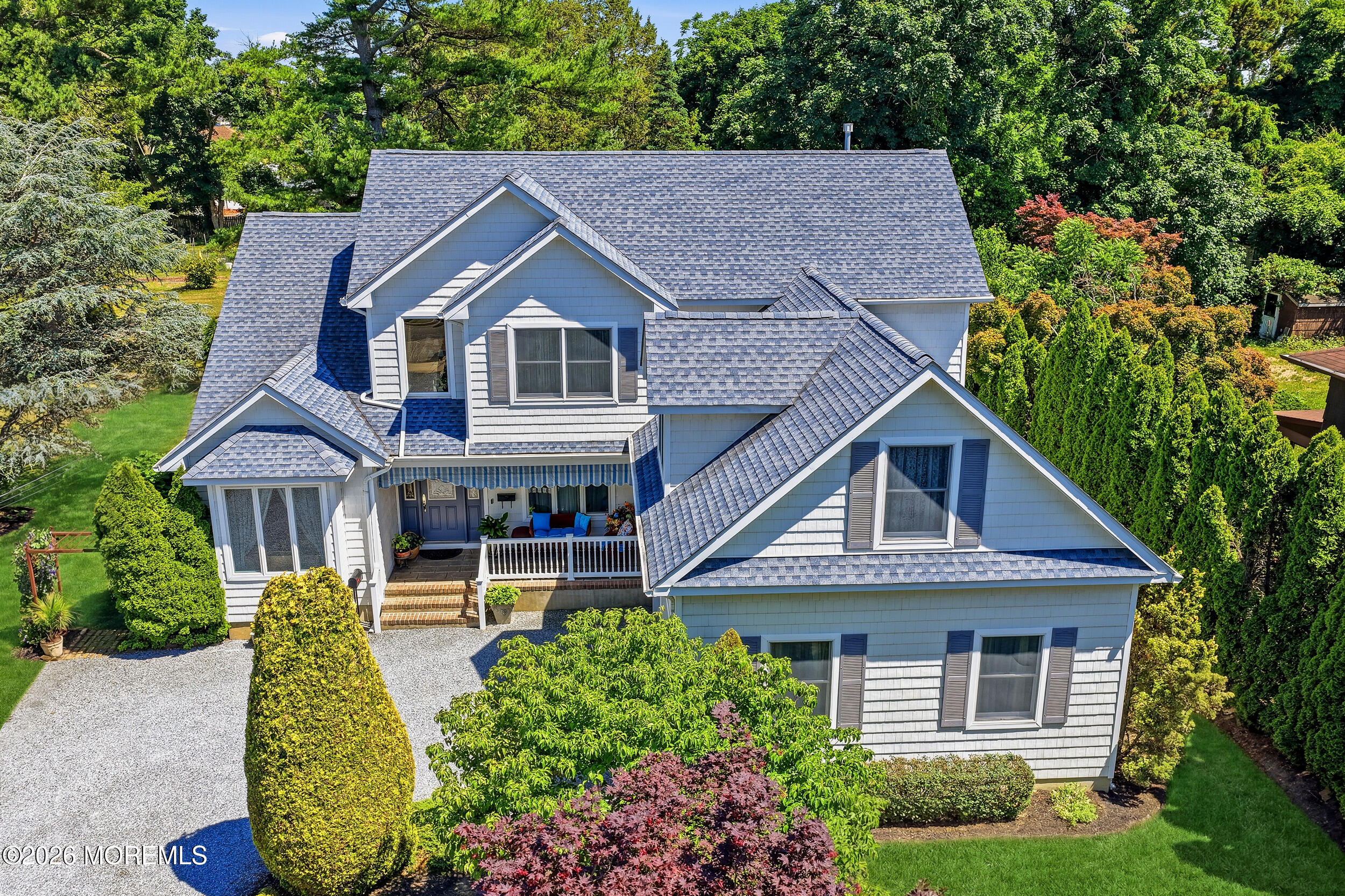 478 Rickey Lane Long Branch, NJ 07740 - Photo 63 of 64 a front view of a house with garden