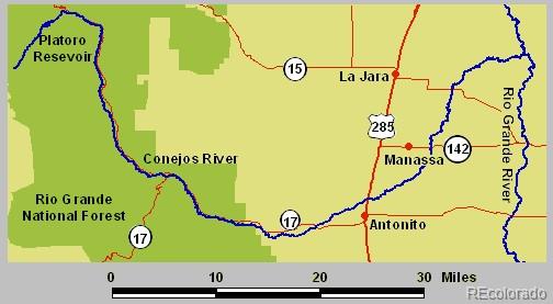 7 Massey Creek Road Antonito, CO 81120 - Photo 12 of 14 a sign that is on a wall next to a wall