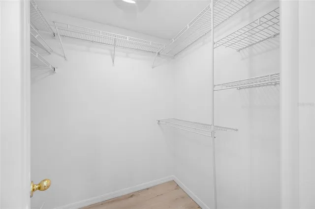 a view of an empty walk in closet