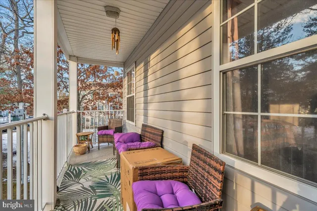 a view of a balcony with couch