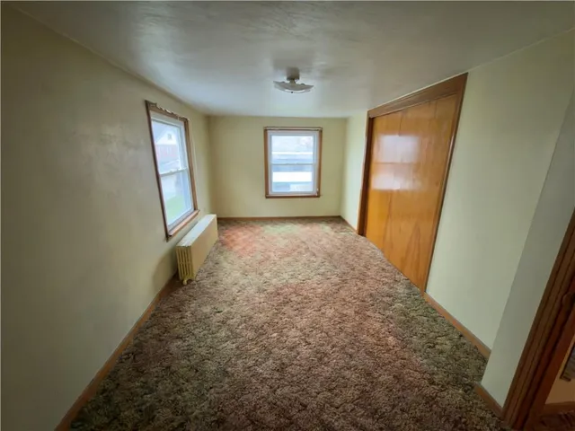 a view of balcony and wooden floor