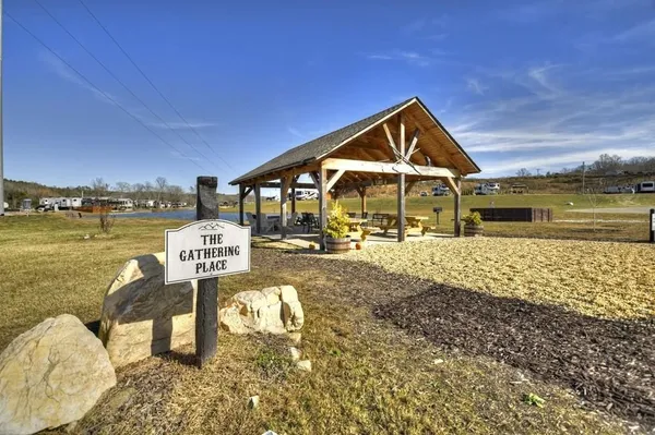 a view of a lake with a house in the background
