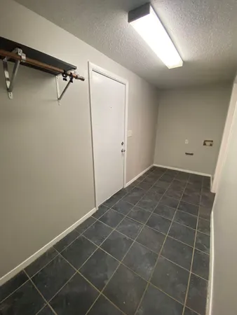 a view of a room with rack on the wall