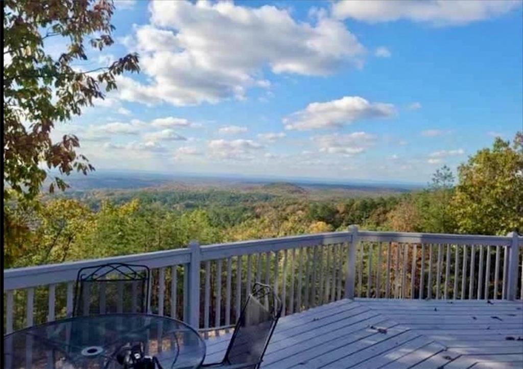 860 Apple Road Ranger, GA 30734 - Photo 1 of 1 a balcony with wooden floor and fence