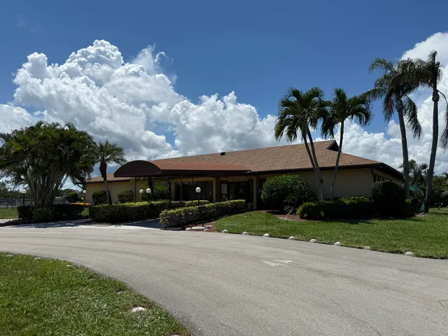 a room with furniture and pool table