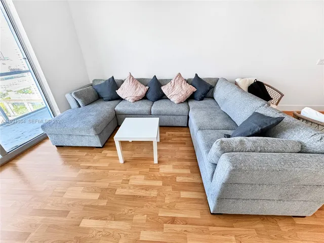 a living room with furniture and a couch