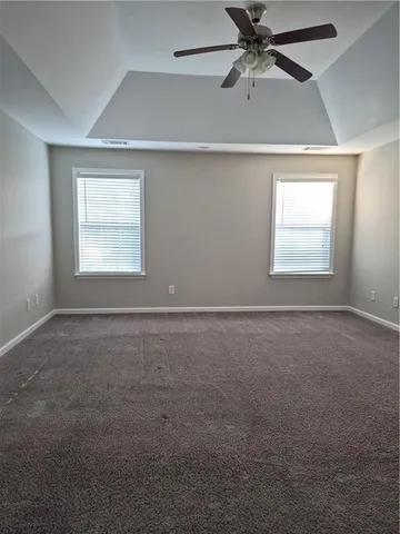an empty room that has a window