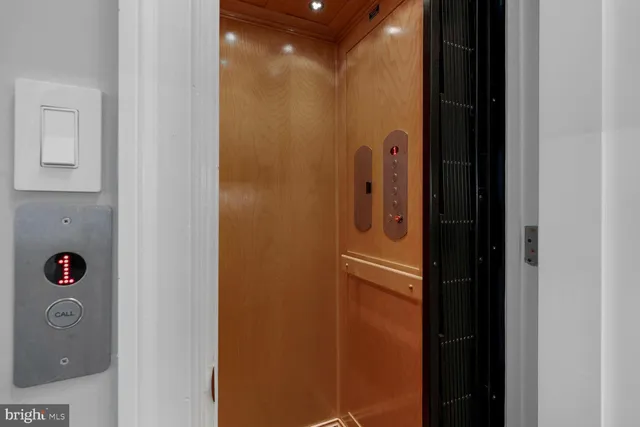 a bathroom with a sink vanity and toilet