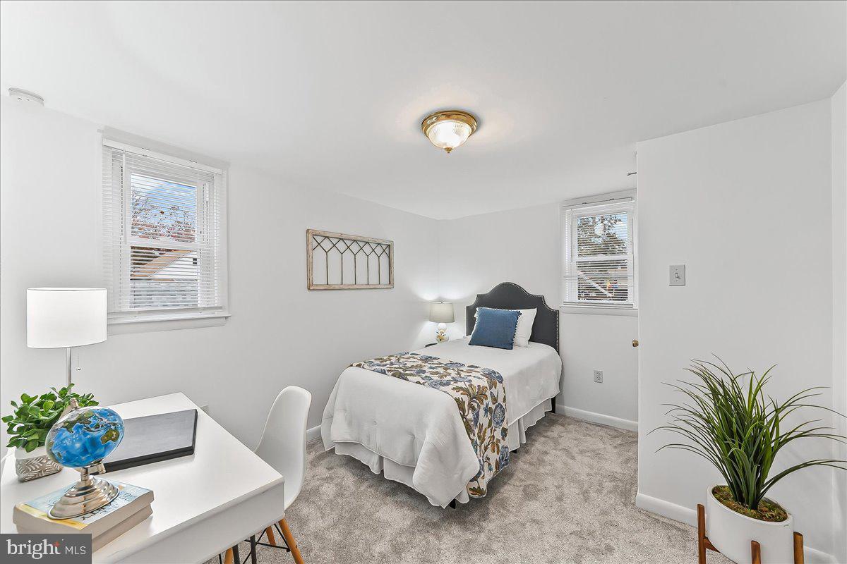 929 Crystle Road Aston, PA 19014 - Photo 16 of 18 a bedroom with a bed and a couch