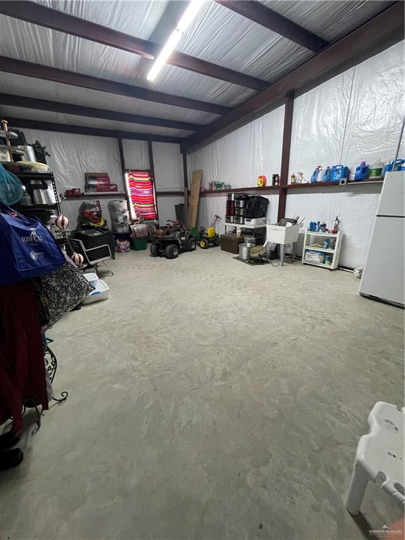 241 Delmita Road Delmita, TX 78536 - Photo 5 of 7 Garage with refrigerator