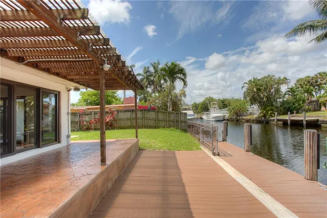 a view of a lake with a swimming pool