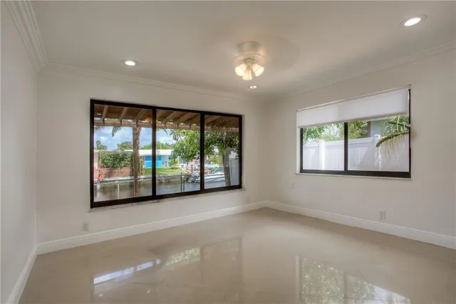 an empty room with windows