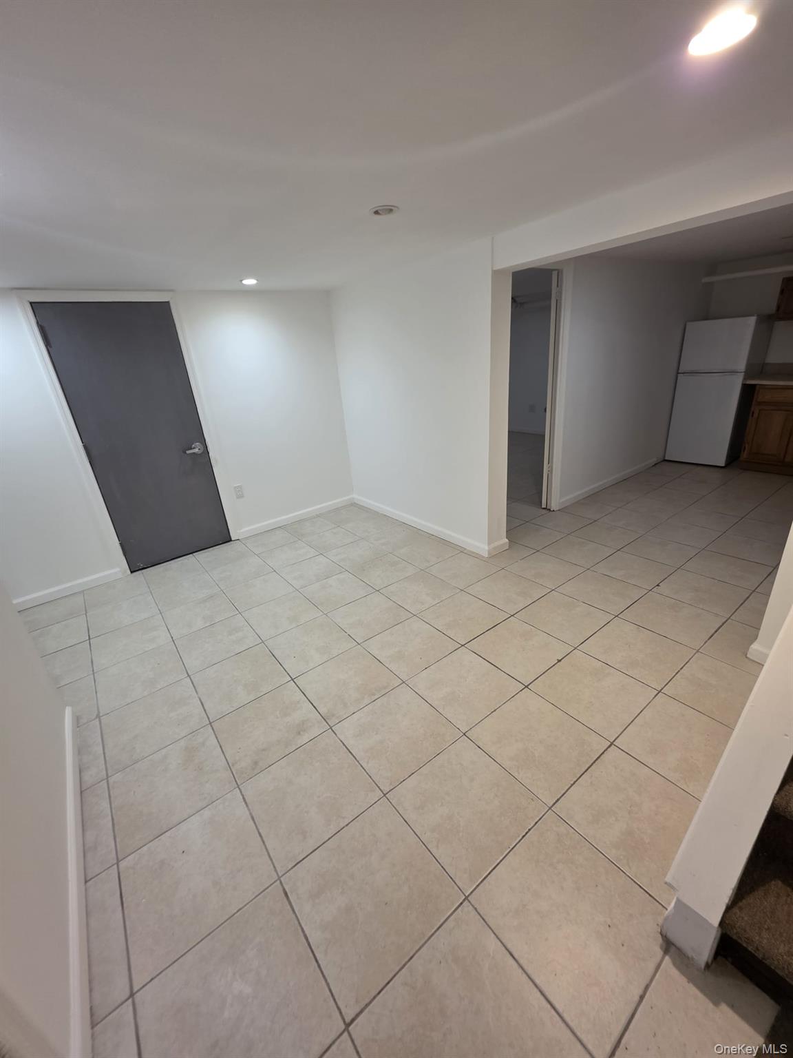 109-73 200th Street Queens, NY 11412 - Photo 12 of 12 a view of an empty room and window